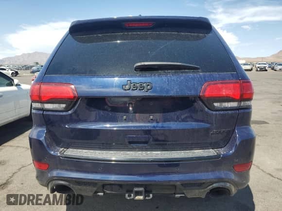 2018 Jeep Grand Cherokee SRT with VIN 1C4RJFDJXJC299443, listed as a Copart auction lot 71565105 with 44,211 mi miles and Salvage title. Bid and sale history available at DreamBid. Image 6.
