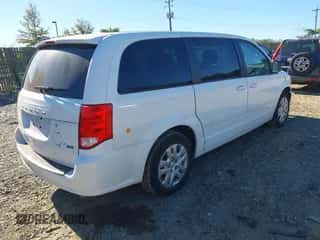 2017 Dodge Grand Caravan SE Plus with VIN 2C4RDGBGXHR854381, listed as a IAAI auction lot 43480263 with 101,923 mi miles and . Bid and sale history available at DreamBid. Image 4.