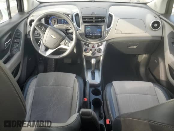 2016 Chevrolet Trax LT with VIN KL7CJLSB7GB614596, listed as a Copart auction lot 85201135 with 104,008 mi miles and Salvage title. Bid and sale history available at DreamBid. Image 8.