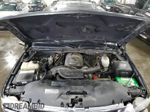 2005 Chevrolet Tahoe Z71 с VIN 1GNEK13T35R227270, выставлен на аукционе Copart как лот 60510395 с пробегом 237 073 миль миль и Списание • Salvage title. История ставок и продаж доступна на DreamBid. Изображение 12.