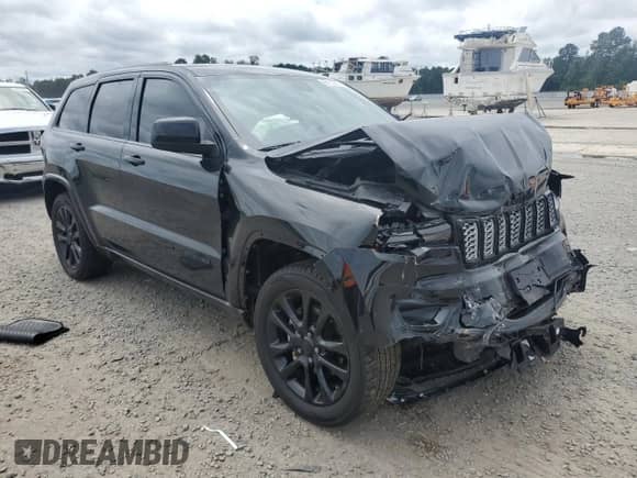 2020 Jeep Grand Cherokee Altitude with VIN 1C4RJEAG8LC203265, listed as a Copart auction lot 68113075 with 108,503 mi miles and Salvage title. Bid and sale history available at DreamBid. Image 4.