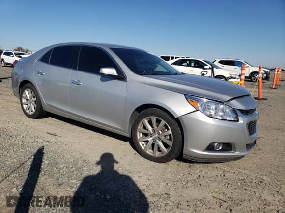 2016 Chevrolet Malibu LTZ with VIN 1G11E5SA7GF103649, listed as a Copart auction lot 82544665 with Not provided miles and Salvage title. Bid and sale history available at DreamBid. Image 4.