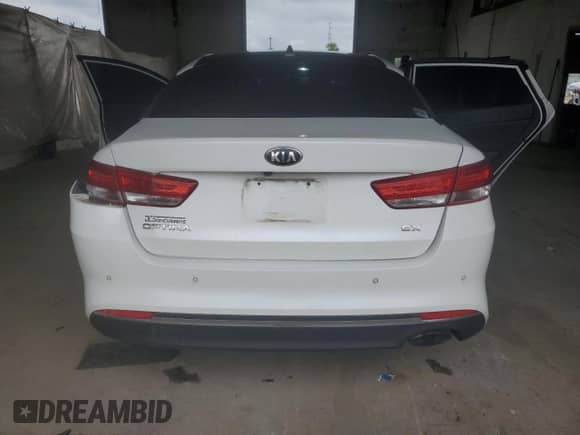 2016 Kia Optima EX with VIN 5XXGU4L34GG032331, listed as a Copart auction lot 71557155 with 127,419 mi miles and Salvage title. Bid and sale history available at DreamBid. Image 6.