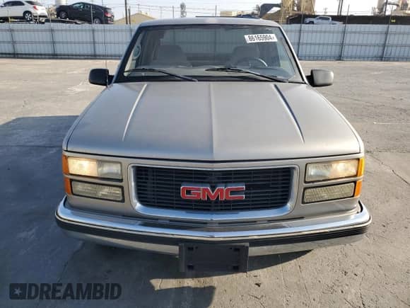 1998 GMC Sierra 1500 z VIN 1GTEC19M7WR513663, wystawiony jako Copart lot #86165904 z przebiegiem 147 608 mil mil oraz Czysty tytuł • Clean title. Historia ofert i sprzedaży dostępna na DreamBid. Obrazek 5.