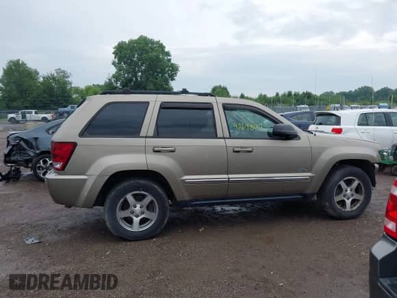 2006 Jeep Grand Cherokee Laredo z VIN 1J4HR48N46C259964, wystawiony jako IAAI lot #42698023 z przebiegiem 201 624 mil mil oraz . Historia ofert i sprzedaży dostępna na DreamBid. Obrazek 14.