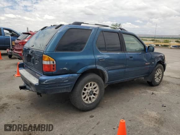 2001 Honda Passport LX with VIN 4S6DM58W014413156, listed as a Copart auction lot 61695045 with 183,594 mi miles and Salvage title. Bid and sale history available at DreamBid. Image 3.