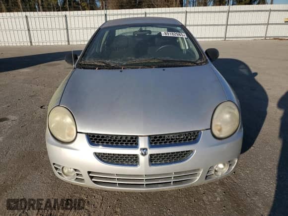 2004 Dodge Neon SXT z VIN 1B3ES56C14D575612, wystawiony jako Copart lot #89182985 z przebiegiem 33 100 mil mil oraz Czysty tytuł • Clean title. Historia ofert i sprzedaży dostępna na DreamBid. Obrazek 5.