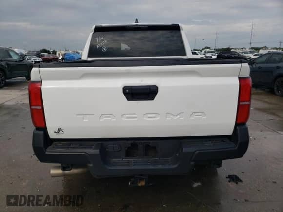 2024 Toyota Tacoma SR with VIN 3TYKD5HN5RT010399, listed as a Copart auction lot 65425115 with Not provided miles and Salvage title. Bid and sale history available at DreamBid. Image 6.