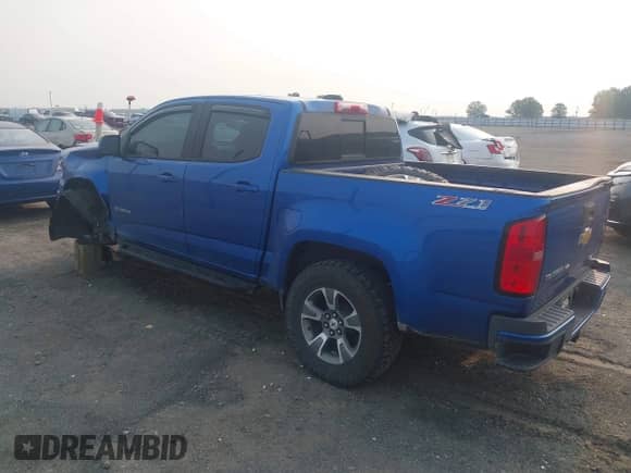 2018 Chevrolet Colorado 4WD Z71 with VIN 1GCGTDEN3J1327148, listed as a IAAI auction lot 42392306 with 70,932 mi miles and . Bid and sale history available at DreamBid. Image 3.