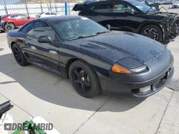 1991 Dodge Stealth with VIN JB3XE74C5MY012599, listed as a Copart auction lot 68479364 with 125,837 mi miles and Salvage title. Bid and sale history available at DreamBid. Image 4.