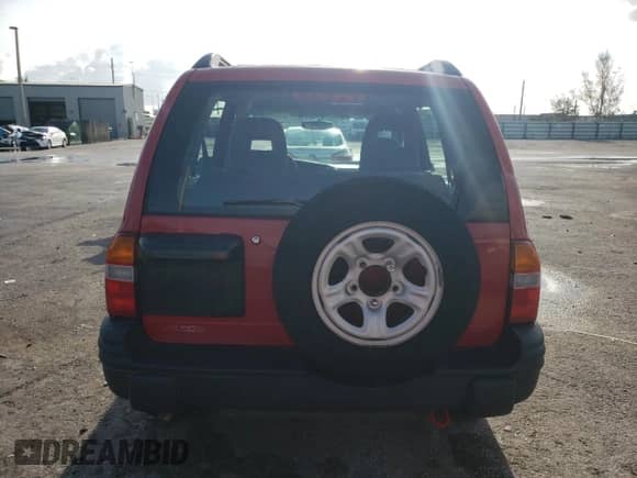 2003 Chevrolet Tracker с VIN 2CNBE13CX36943395, выставлен на аукционе Copart как лот 70964574 с пробегом 118 975 миль миль и Списание • Salvage title. История ставок и продаж доступна на DreamBid. Изображение 6.