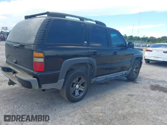 2005 Chevrolet Tahoe Z71 с VIN 1GNEK13T35R218584, выставлен на аукционе IAAI как лот 42987718 с пробегом 209 954 миль миль и . История ставок и продаж доступна на DreamBid. Изображение 4.