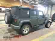 2008 Jeep Wrangler Unlimited X with VIN 1J4GA39158L583789, listed as a Copart auction lot 86292065 with 170,334 mi miles and Salvage title. Bid and sale history available at DreamBid. Image 3.