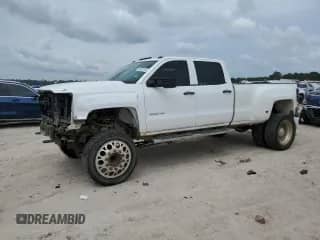 2015 Chevrolet Silverado 3500 с VIN 1GC4CYCGXFF634874, выставлен на аукционе Copart как лот 69923284 с пробегом 135 462 миль миль и Списание • Salvage title. История ставок и продаж доступна на DreamBid. Изображение 1.