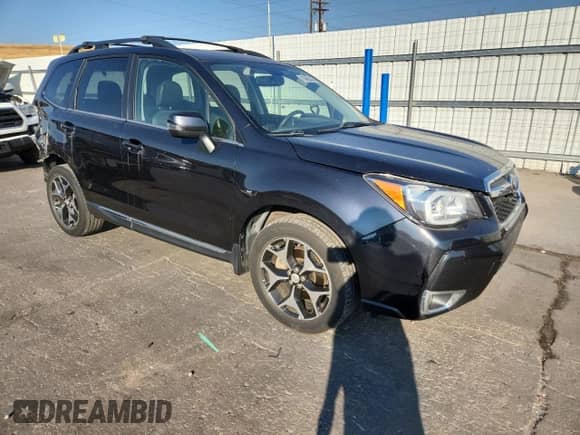 2016 Subaru Forester XT Touring with VIN JF2SJGXC4GH456384, listed as a Copart auction lot 70045345 with 107,427 mi miles and Salvage title. Bid and sale history available at DreamBid. Image 4.