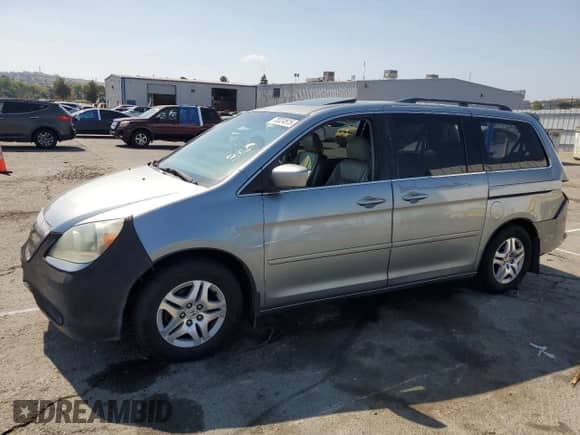 2007 Honda Odyssey EX-L z VIN 5FNRL38637B043607, wystawiony jako Copart lot #70324515 z przebiegiem 193 337 mil mil oraz Szkoda całkowita • Salvage title. Historia ofert i sprzedaży dostępna na DreamBid. Obrazek 1.
