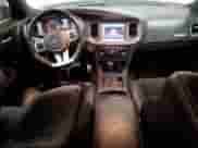 2014 Dodge Charger SRT-8 с VIN 2C3CDXEJ6EH283569, выставлен на аукционе Copart как лот 77036274 с пробегом 77 356 миль миль и Списание • Salvage title. История ставок и продаж доступна на DreamBid. Изображение 8.