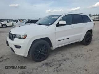 2018 Jeep Grand Cherokee Laredo with VIN 1C4RJFAG9JC303121, listed as a Copart auction lot 90259455 with 125,299 mi miles and Clean title. Bid and sale history available at DreamBid. Image 1.