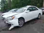 2004 Toyota Camry LE with VIN JTDBE32K740273954, listed as a IAAI auction lot 42323760 with 250,815 mi miles and . Bid and sale history available at DreamBid. Image 2.