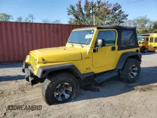 2004 Jeep Wrangler Sport z VIN 1J4FA49S14P708543, wystawiony jako Copart lot #82703525 z przebiegiem 197 964 mil mil oraz Czysty tytuł • Clean title. Historia ofert i sprzedaży dostępna na DreamBid. Obrazek 1.