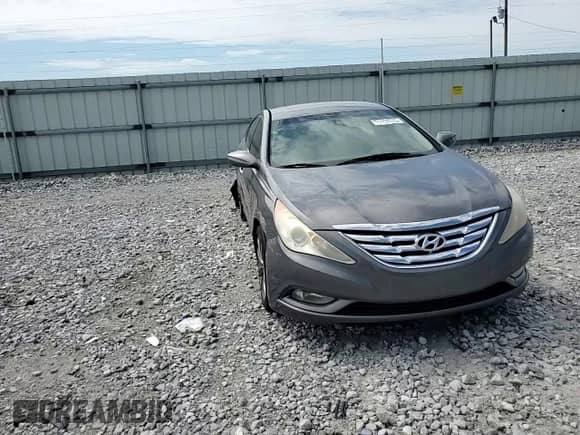 2012 Hyundai Sonata SE z VIN 5NPEC4AC7CH480588, wystawiony jako Copart lot #71114035 z przebiegiem 182 328 mil mil oraz Szkoda całkowita • Salvage title. Historia ofert i sprzedaży dostępna na DreamBid. Obrazek 13.