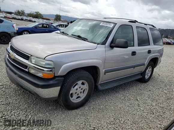 2004 Chevrolet Tahoe LS with VIN 1GNEC13V04J122360, listed as a Copart auction lot 86480285 with 147,522 mi miles and Salvage title. Bid and sale history available at DreamBid. Image 1.
