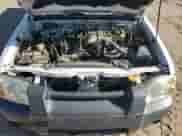 2002 Nissan Frontier XE z VIN 1N6ED26T52C366879, wystawiony jako Copart lot #67726024 z przebiegiem 141 068 mil mil oraz Szkoda całkowita • Salvage title. Historia ofert i sprzedaży dostępna na DreamBid. Obrazek 12.