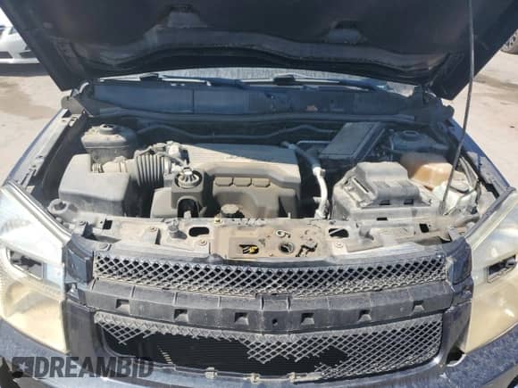 2007 Chevrolet Equinox LS z VIN 2CNDL13FX76251457, wystawiony jako Copart lot #69228584 z przebiegiem Nie podano mil oraz Szkoda całkowita • Salvage title. Historia ofert i sprzedaży dostępna na DreamBid. Obrazek 12.