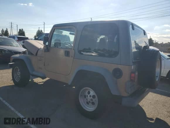 1999 Jeep Wrangler Sport with VIN 1J4FY19S9XP417531, listed as a Copart auction lot 86538315 with 161,004 mi miles and Salvage title. Bid and sale history available at DreamBid. Image 2.