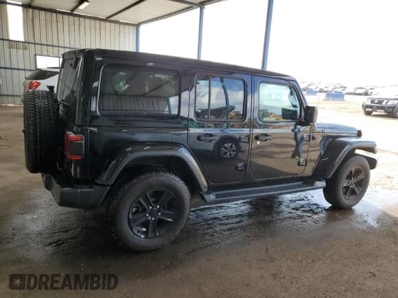 2023 Jeep Wrangler Sahara Altitude with VIN 1C4HJXEG1PW614643, listed as a Copart auction lot 52128245 with 9,890 mi miles and Clean title. Bid and sale history available at DreamBid. Image 3.