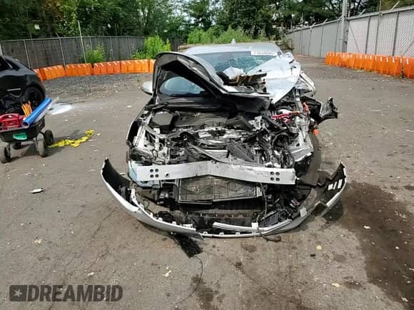 2018 Chevrolet Volt LT z VIN 1G1RC6S53JU141996, wystawiony jako Copart lot #71634685 z przebiegiem 59 084 mil mil oraz Szkoda całkowita • Salvage title. Historia ofert i sprzedaży dostępna na DreamBid. Obrazek 13.