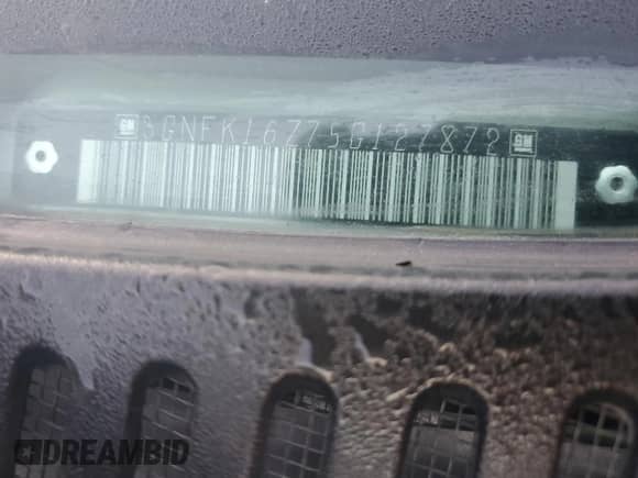 2005 Chevrolet Suburban LS with VIN 3GNFK16Z75G127872, listed as a Copart auction lot 77887864 with 201,471 mi miles and Salvage title. Bid and sale history available at DreamBid. Image 13.