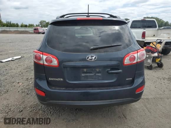2012 Hyundai Santa Fe SE with VIN 5XYZHDAG4CG145172, listed as a Copart auction lot 67639785 with 76,302 mi miles and Salvage title. Bid and sale history available at DreamBid. Image 6.