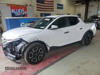 2022 Hyundai Santa Cruz SE с VIN 5NTJADAE1NH011278, выставлен на аукционе Copart как лот 83926645 с пробегом 70 266 миль миль и Списание • Salvage title. История ставок и продаж доступна на DreamBid. Изображение 1.