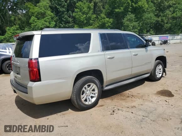 2015 Chevrolet Suburban LT с VIN 1GNSCJKC9FR279344, выставлен на аукционе Copart как лот 65216185 с пробегом 293 026 миль миль и Списание • Salvage title. История ставок и продаж доступна на DreamBid. Изображение 3.
