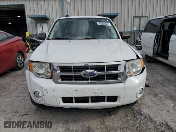 2011 Ford Escape XLT с VIN 1FMCU9D73BKB74256, выставлен на аукционе Copart как лот 85528595 с пробегом 222 570 миль миль и Списание • Salvage title. История ставок и продаж доступна на DreamBid. Изображение 5.