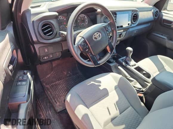 2022 Toyota Tacoma SR z VIN 3TYSZ5AN0NT082424, wystawiony jako Copart lot #65411225 z przebiegiem 22 506 mil mil oraz Szkoda całkowita • Salvage title. Historia ofert i sprzedaży dostępna na DreamBid. Obrazek 8.