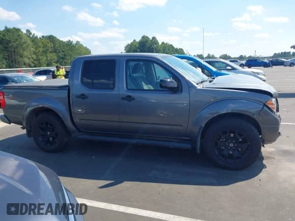 2021 Nissan Frontier Pro-4X with VIN 1N6ED0EB2MN713637, listed as a IAAI auction lot 43128392 with 90,237 mi miles and . Bid and sale history available at DreamBid. Image 13.