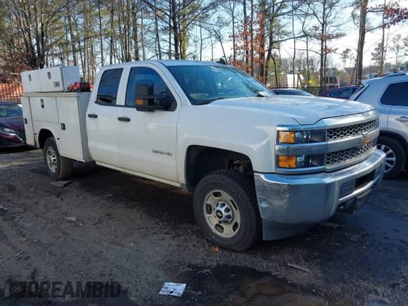 2019 Chevrolet Silverado 2500HD z VIN 2GB2KREG7K1219823, wystawiony jako IAAI lot #41363048 z przebiegiem 256 734 mil mil oraz . Historia ofert i sprzedaży dostępna na DreamBid. Obrazek 1.