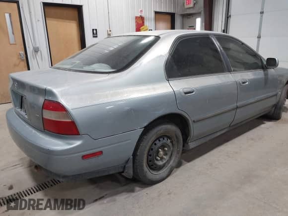 1995 Honda Accord LX with VIN 1HGCD5637SA100093, listed as a IAAI auction lot 43136050 with 153,199 mi miles and . Bid and sale history available at DreamBid. Image 4.