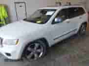 2011 Jeep Grand Cherokee Overland with VIN 1J4RR6GG2BC744729, listed as a IAAI auction lot 43163674 with 227,711 mi miles and . Bid and sale history available at DreamBid. Image 2.