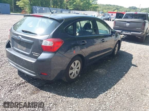 2014 Subaru Impreza 2.0i z VIN JF1GPAA60E8299071, wystawiony jako IAAI lot #42968181 z przebiegiem 238 532 mil mil oraz . Historia ofert i sprzedaży dostępna na DreamBid. Obrazek 4.