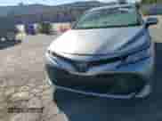 2020 Toyota Camry LE z VIN 4T1C11AK8LU351957, wystawiony jako Copart lot #86512345 z przebiegiem 83 646 mil mil oraz Szkoda całkowita • Salvage title. Historia ofert i sprzedaży dostępna na DreamBid. Obrazek 14.
