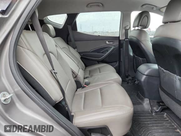 2017 Hyundai Santa Fe 2.4L z VIN 5NMZU3LB4HH046792, wystawiony jako Copart lot #82055665 z przebiegiem 149 385 mil mil oraz Czysty tytuł • Clean title. Historia ofert i sprzedaży dostępna na DreamBid. Obrazek 11.
