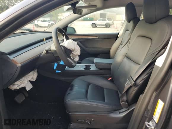 2023 Tesla Model Y Long Range with VIN 7SAYGAEE4PF668889, listed as a Copart auction lot 67239314 with 26,874 mi miles and Salvage title. Bid and sale history available at DreamBid. Image 7.