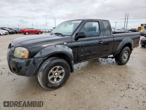 2001 Nissan Frontier SE Desert Runner with VIN 1N6ED26T91C394912, listed as a Copart auction lot 60559095 with 245,633 mi miles and Clean title. Bid and sale history available at DreamBid. Image 1.