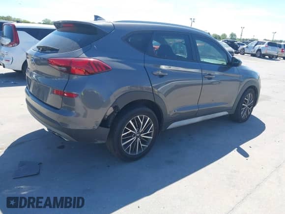 2021 Hyundai Tucson SEL with VIN KM8J33AL2MU375842, listed as a IAAI auction lot 41839481 with 76,643 mi miles and . Bid and sale history available at DreamBid. Image 4.