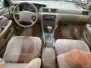 1997 Toyota Camry LE z VIN JT2BF22K2V0048990, wystawiony jako Copart lot #58781925 z przebiegiem 146 216 mil mil oraz Szkoda całkowita • Salvage title. Historia ofert i sprzedaży dostępna na DreamBid. Obrazek 8.