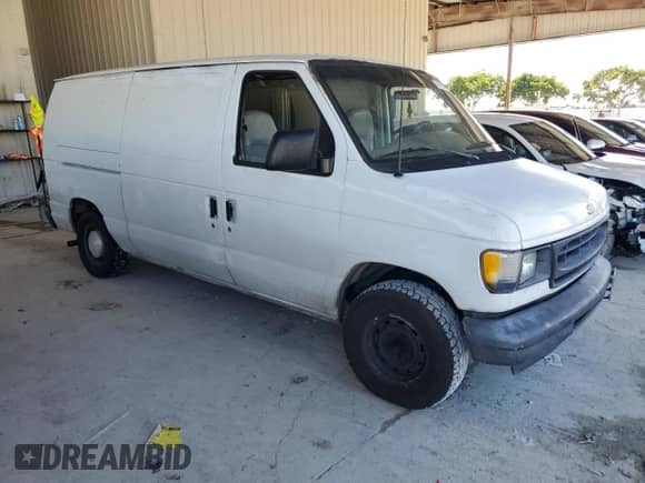 2002 Ford Econoline Cargo with VIN 1FTRE14292HB60778, listed as a Copart auction lot 74345234 with 173,366 mi miles and Salvage title. Bid and sale history available at DreamBid. Image 4.