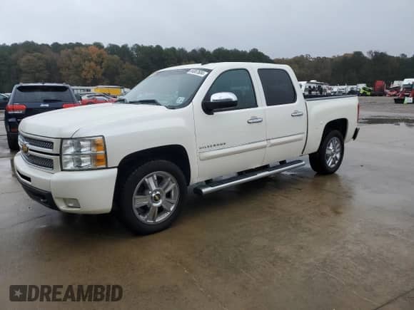 2012 Chevrolet Silverado 1500 LTZ with VIN 3GCPCTE0XCG186727, listed as a Copart auction lot 84007604 with 242,722 mi miles and Clean title. Bid and sale history available at DreamBid. Image 1.